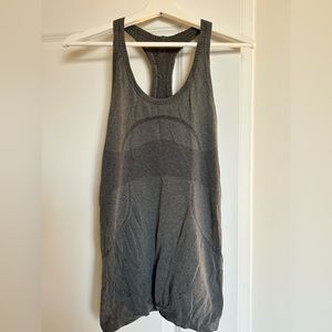 Two Lululemon tanks size 4